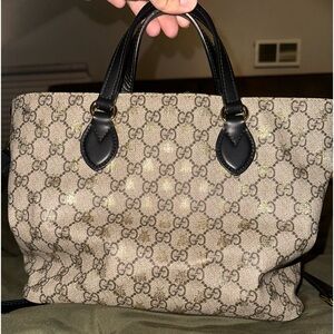 Authentic Gucci Purse 
Inside has a few minor stains, Outside is flawless!